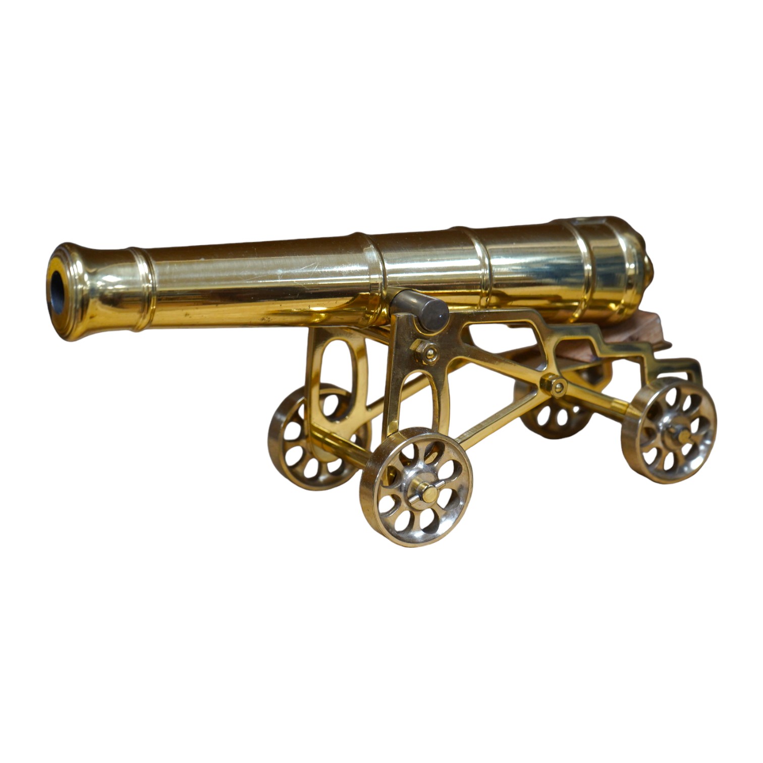 A modern brass model of a 17th century cannon, barrel 19cm long. Condition - good